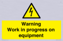 warning-work-in-progress-on-equipmentwith-electrical-hazard-symbol~